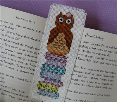 Spring Owl Sitting on Books