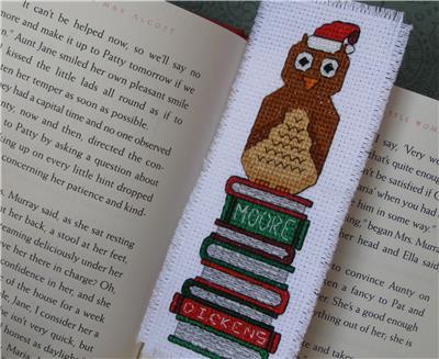 Christmas Owl Sitting on Books